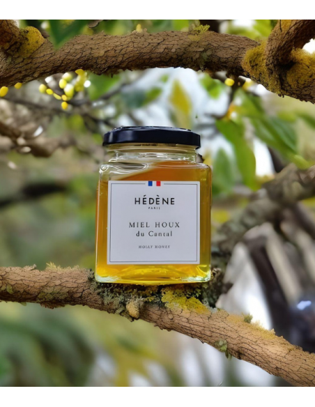 Miel de houx du Cantal, couleur cristalline et reflets dorés.