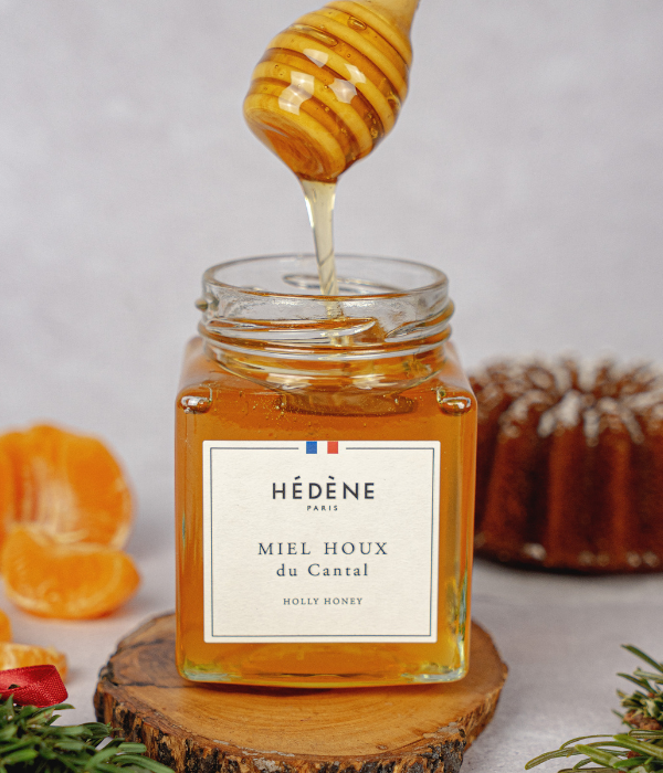Miel de houx liquide, parfait pour sucrer boissons chaudes et desserts.