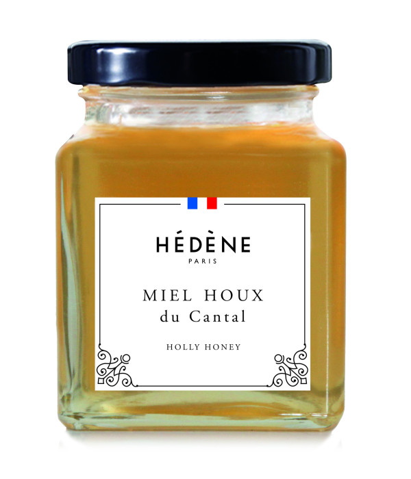 Pot de miel de houx du Cantal, arômes boisés et texture liquide.