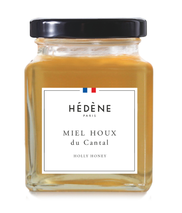 A jar of Cantal holly honey, with woody aromas and a liquid texture.